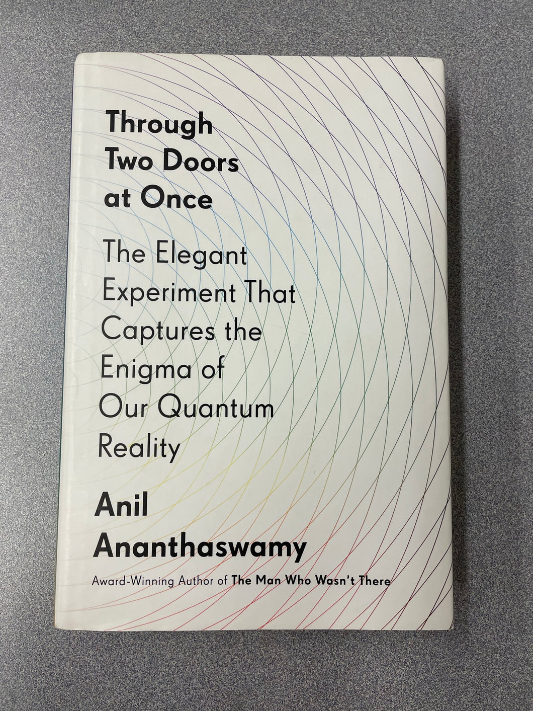 Through Two Doors at Once: The Elegant Experiment That Captures the Enigma of Our Quantum Reality, Ananthaswamy, Anil [2018] SN 12/22